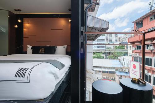 Cama o camas de una habitación en Hotel 433 - Asoke Sukhumvit