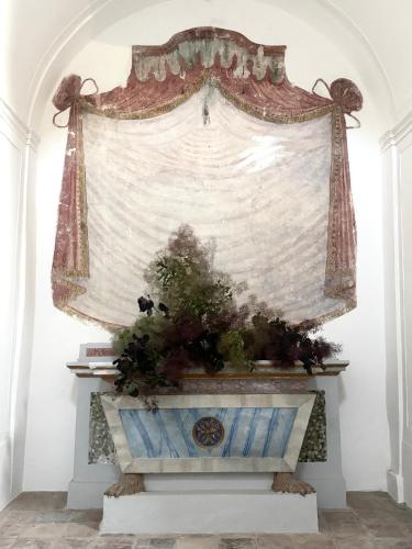 a window in a room with a curtain at Scavolo Borgo in SantʼAgata Feltria