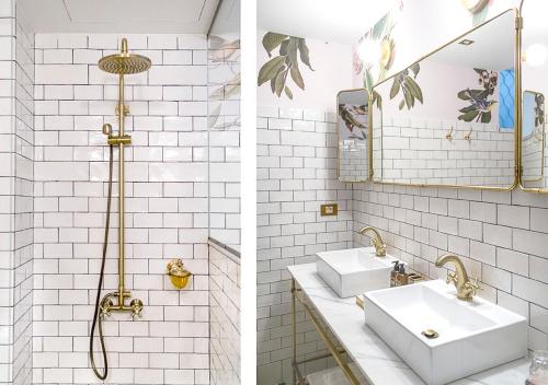 a bathroom with two sinks and a mirror at Casa Timoteo Apartamentos Boutique Adults Only in Alcoy