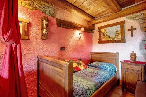 Letto o letti in una camera di Affittacamere Saint-Salod