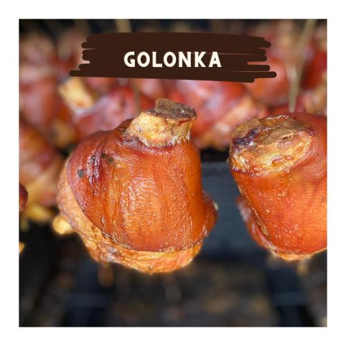 two pieces of food that are hanging up at Olza Karczma i pokoje in Istebna
