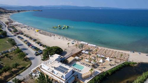 an aerial view of a beach with a resort at Linari Sea & Suites in Ormos Panagias