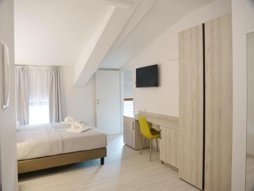 Postel nebo postele na pokoji v ubytování Hotel Castrum