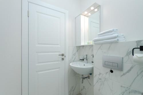 Koupelna v ubytování Petrovdom Apartments 14-2 in RC Diplomat Hall, Zhylianska 59