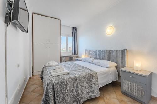 Ένα ή περισσότερα κρεβάτια σε δωμάτιο στο Ocean View - 1 Bedroom Apartment in Los Cristianos