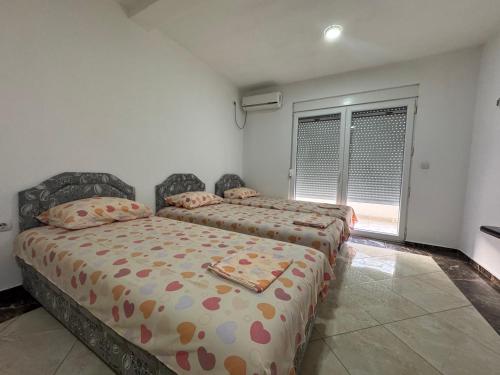 Postel nebo postele na pokoji v ubytování Berlin Vila Ulcinj