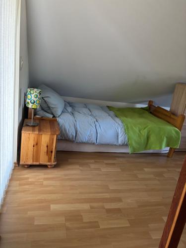 Postel nebo postele na pokoji v ubytování Domek Słonecznego Poranka