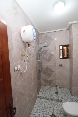 Koupelna v ubytování AfriqPnB RF2 Studio Mvog Atangana avec Piscine