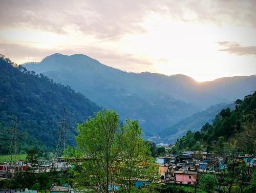 a view of a valley with mountains in the background at Anand Hill View Apartment in Nākuri
