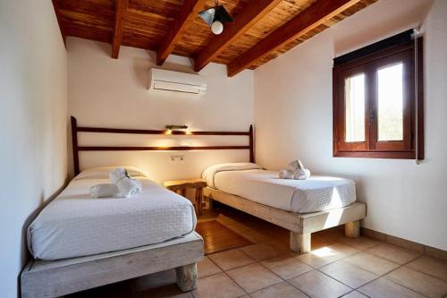 Ένα ή περισσότερα κρεβάτια σε δωμάτιο στο Casa Rustick