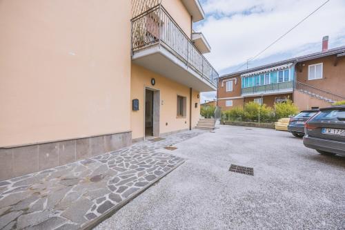 an empty parking lot in front of a building at Dimora della saggina in Assisi