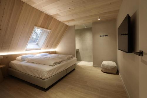 Katil atau katil-katil dalam bilik di Lodge - 4 personen - Woodz Lodges