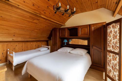 Postel nebo postele na pokoji v ubytování La Maison des Primevères - proche plages