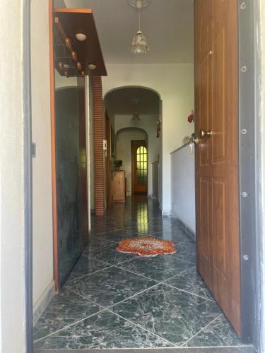 an empty hallway with a rug on the floor at marella in Minori