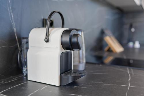 a toaster sitting on top of a kitchen counter at Bohemian Glow of Krumlov in Český Krumlov