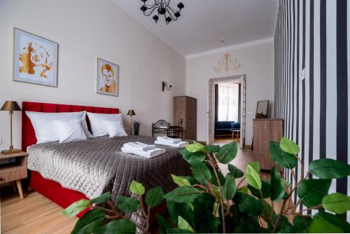 Ένα ή περισσότερα κρεβάτια σε δωμάτιο στο be HAPPY Apartments