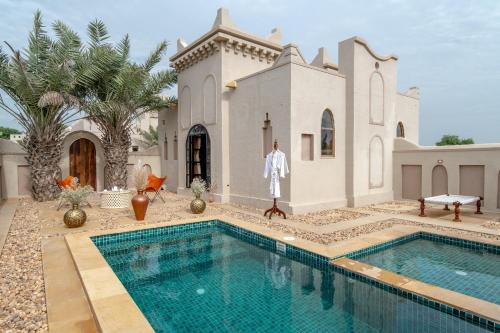 La alberca dentro o cerca de Karwaan Jaisalmer