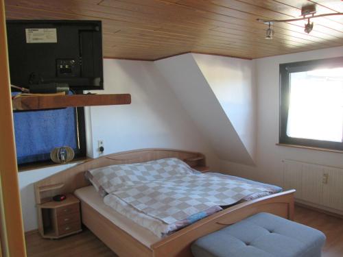 Postel nebo postele na pokoji v ubytování FeWo Ahornweg