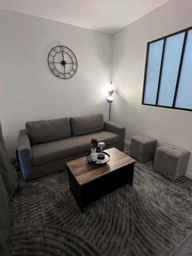 Posezení v ubytování Le Confidentiel avec parking