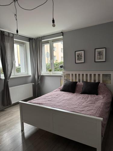Posteľ alebo postele v izbe v ubytovaní Apartament ToTuGdynia 2