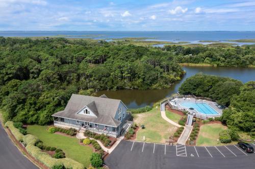 an aerial view of a house with a swimming pool at Ocean Escape in Corolla