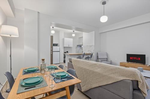 a dining room with a table and chairs at Athens Urban Lifestyle Apartments in Athens