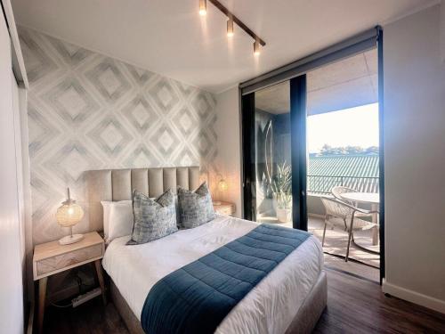 Postel nebo postele na pokoji v ubytování Coral Cove - Mossel Cove Unit 211