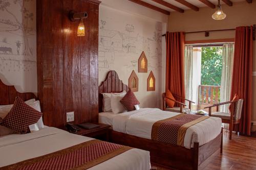 Voodi või voodid majutusasutuse Hotel Jungle Crown toas