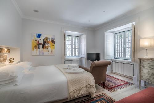 Ένα ή περισσότερα κρεβάτια σε δωμάτιο στο Quinta de Sao Tadeu