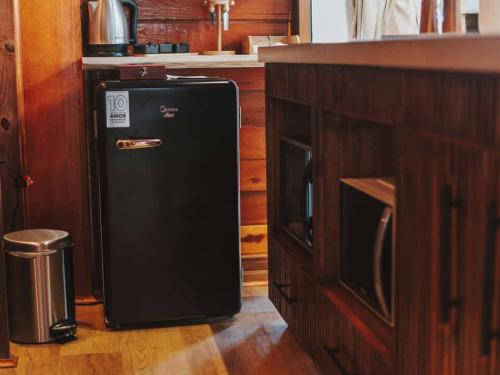 Dapur atau dapur kecil di Vale Aurora Cabanas