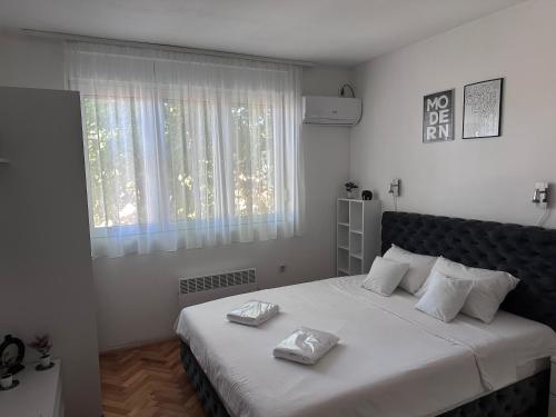 Postel nebo postele na pokoji v ubytování White M