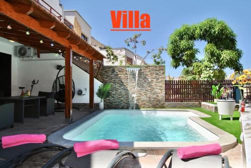 Villa Puerto Rico in front of the shopping center with private heated saltwater pool with jacuzzi function & arcade games OR St andard Villa Puerto Rico in front of the shopping center with private heated saltwater large jacuzzi No Pool& arcade games
