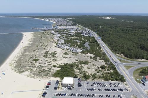 an aerial view of a beach with cars parked at Town of Lewes --- 8 Georgia Ave. Unit 2 in Lewes