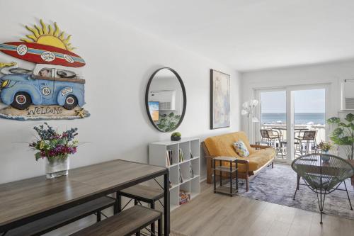 a living room with a table and a dining room at Town of Lewes --- 8 Georgia Ave. Unit 2 in Lewes