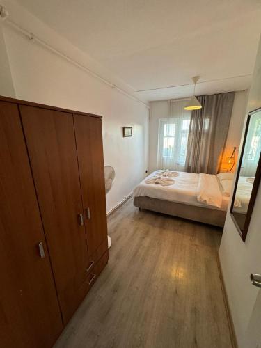 Postel nebo postele na pokoji v ubytování Hotel Antique