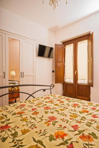 Cama o camas de una habitación en Dimora Le Antiche Torri