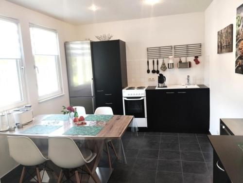 Η κουζίνα ή μικρή κουζίνα στο Ferienhaus Ferienwohnung Schöneberg