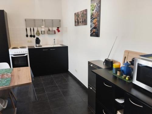 Η κουζίνα ή μικρή κουζίνα στο Ferienhaus Ferienwohnung Schöneberg