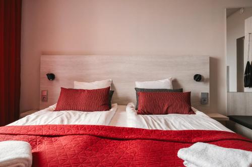 Ένα ή περισσότερα κρεβάτια σε δωμάτιο στο Dream - Luxury Hostel