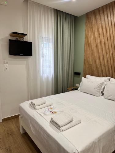 Ένα ή περισσότερα κρεβάτια σε δωμάτιο στο Casa Leonidas