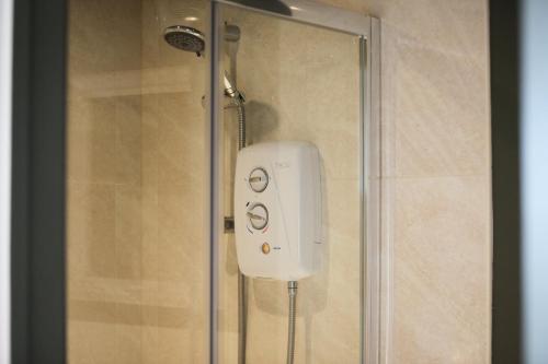 Ένα μπάνιο στο Studio Lodge with parking - Stansted airport