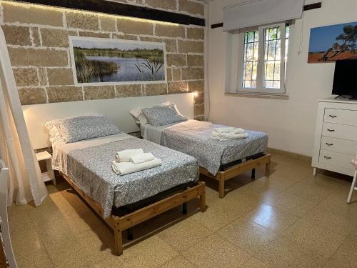 Ένα ή περισσότερα κρεβάτια σε δωμάτιο στο Masseria La Torre