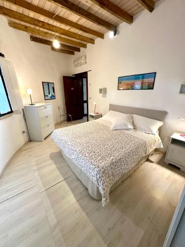 Ένα ή περισσότερα κρεβάτια σε δωμάτιο στο Masseria La Torre