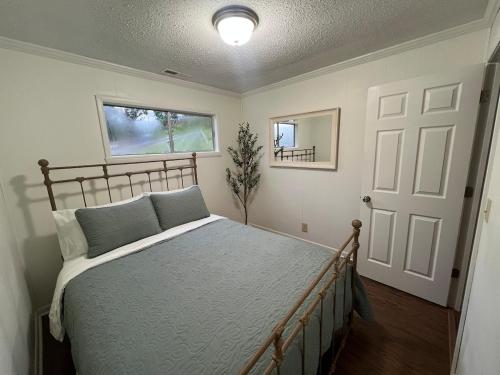 a bedroom with a bed and a white door at Betters View in Bremen