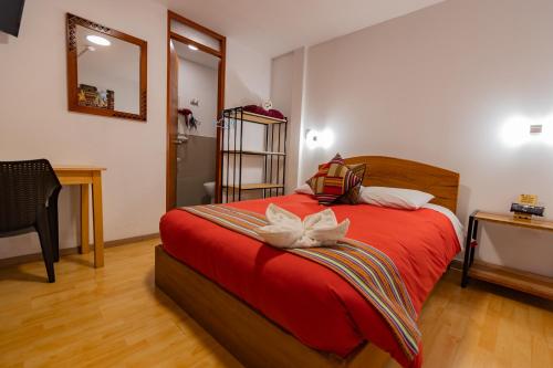 Cama o camas de una habitación en Andes House Cusco