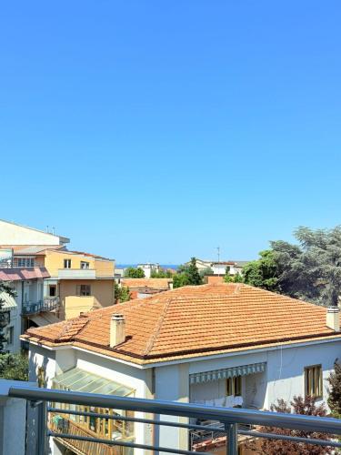 a view of a building with a red roof at Le Dimore di Giò 515 in Ortona