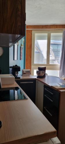 Photo de la galerie de l'établissement Oscar et Petrus au Lioran, à Laveissière