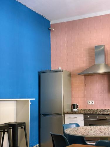 Η κουζίνα ή μικρή κουζίνα στο Rio Hostel