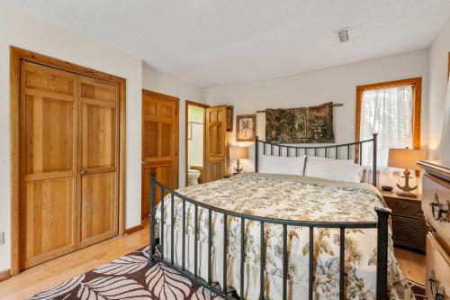 a bedroom with a bed in a room at Dunewood in Corolla