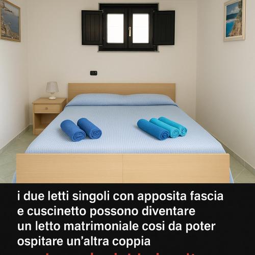 Ένα ή περισσότερα κρεβάτια σε δωμάτιο στο SaDomuNostra
